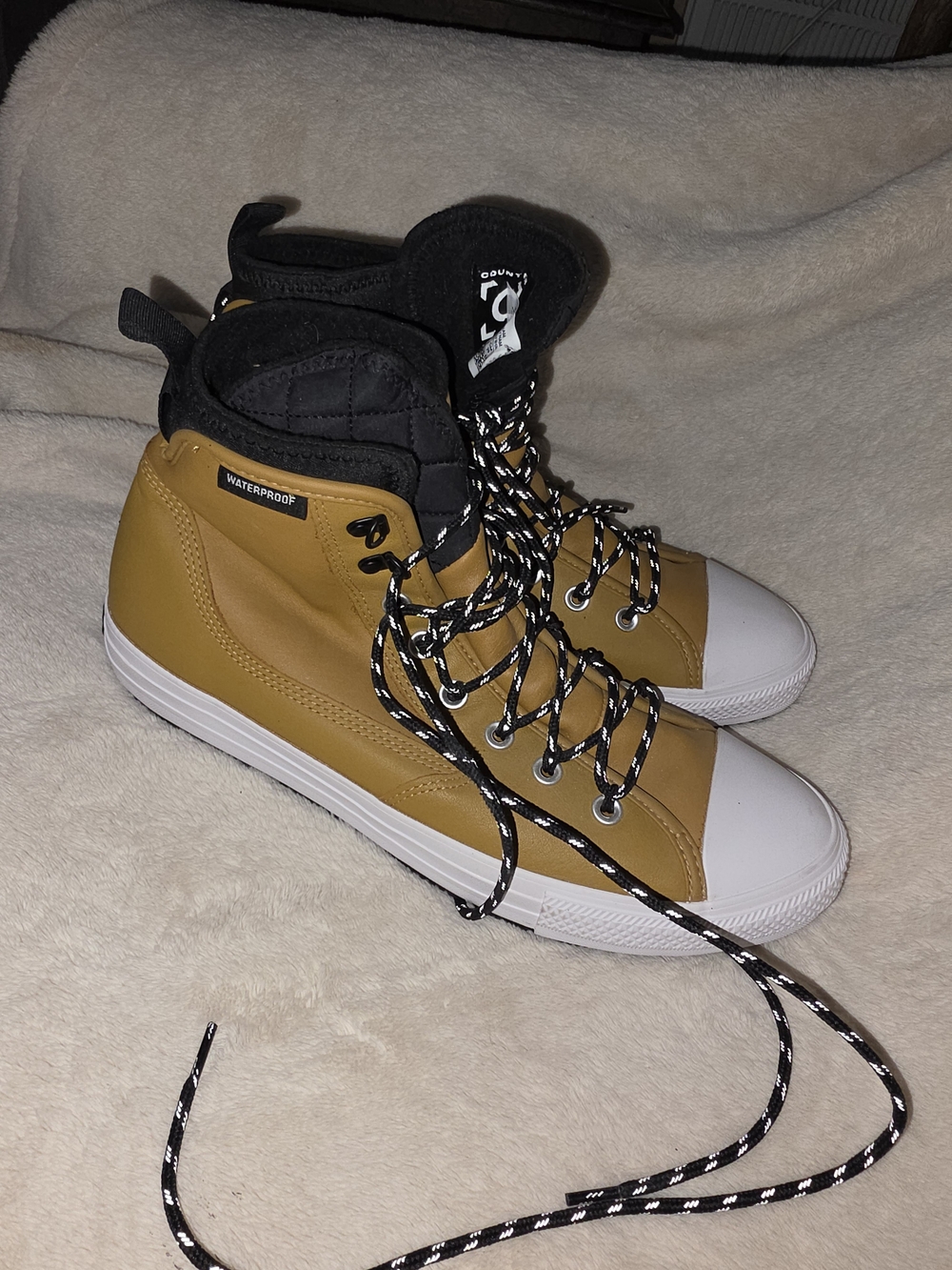 Waterproof Tan High-Top Sneakers with Black Collar and White Toe Chuck Taylor